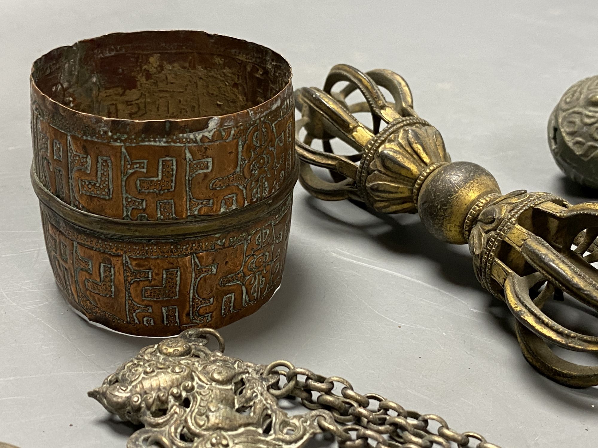 Two Tibetan bronze vajra sceptres and other Buddhist implements, 19th century